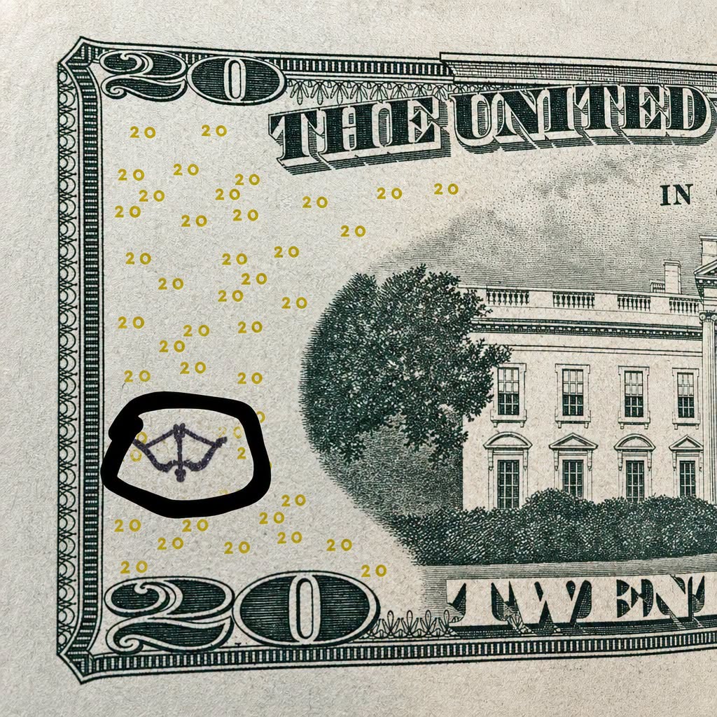 Why Some U.S. Bills Have a Bow and Arrow Mark
